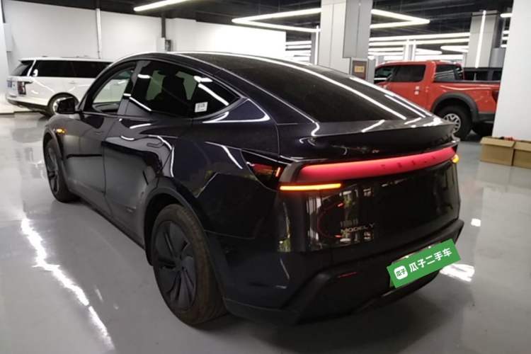 Used Tesla Model Y 2025 Rear-Wheel Drive First Edition Rear Left 45 Deg