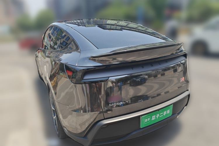 Used Tesla Model Y 2025 Long-Range All-Wheel Drive First Edition Rear Left 45 Deg