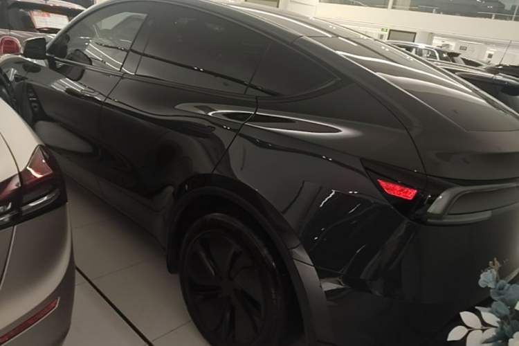 Used Tesla Model Y 2025 Long-Range All-Wheel Drive First Edition Rear Left 45 Deg