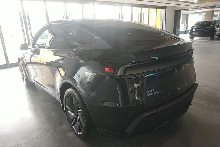 Used Tesla Model Y 2025 Rear-Wheel Drive First Edition Rear Left 45 Deg