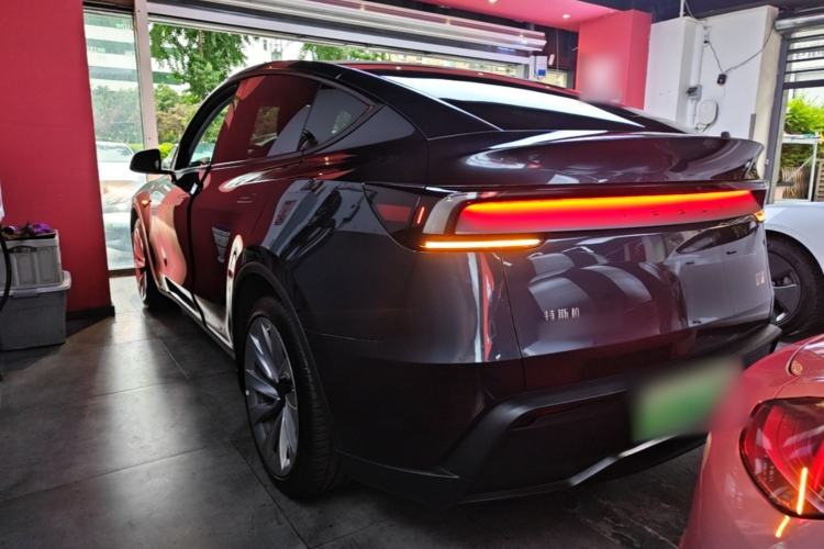 Used Tesla Model Y 2025 Long-Range All-Wheel Drive First Edition Rear Left 45 Deg