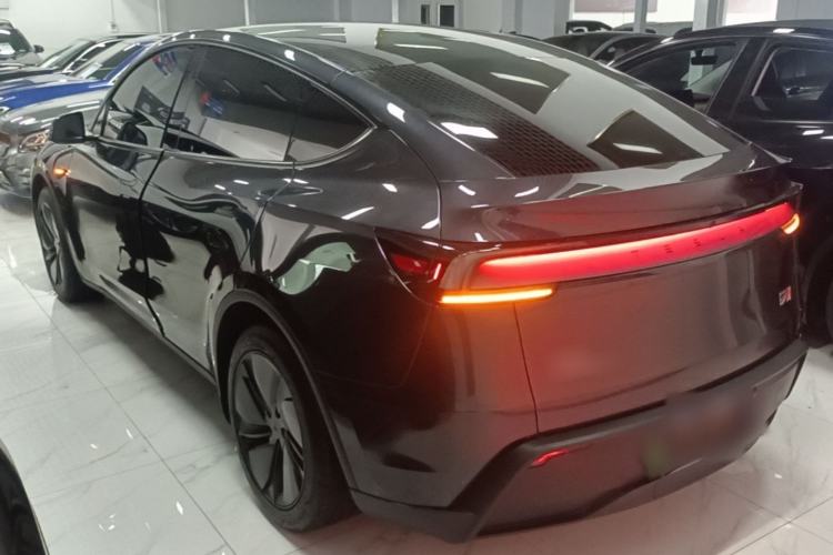 Used Tesla Model Y 2025 Rear-Wheel Drive First Edition Rear Left 45 Deg