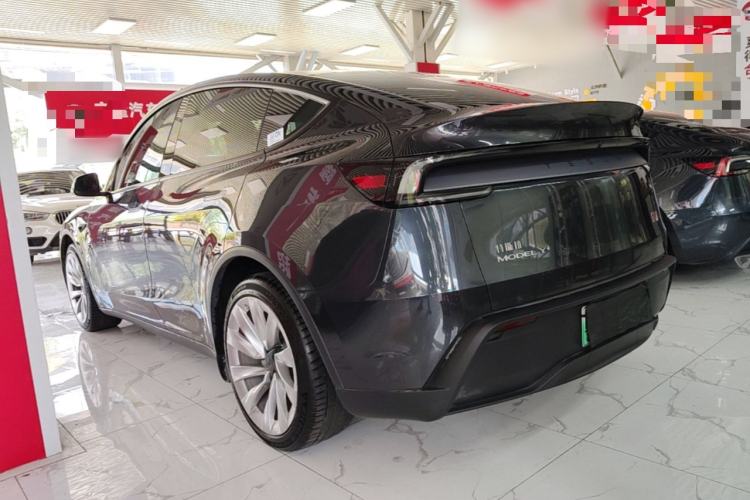 Used Tesla Model Y 2025 Long-Range All-Wheel Drive First Edition Rear Left 45 Deg