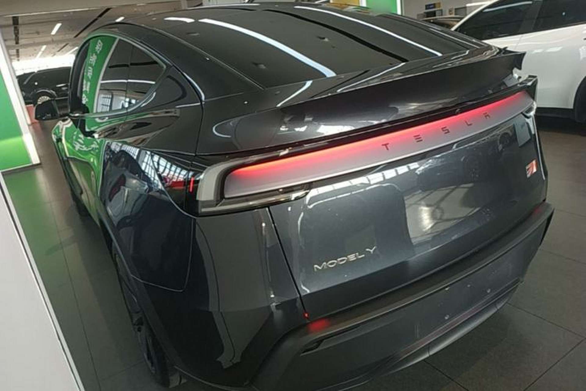 Used Tesla Model Y 2025 Rear-Wheel Drive First Edition Rear Left 45 Deg
