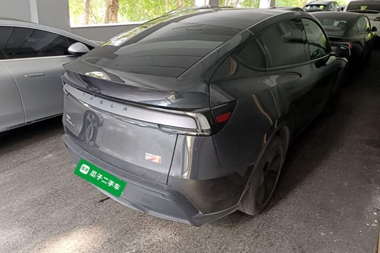 Used Tesla Model Y 2025 Rear-Wheel Drive First Edition Rear Right 45 Deg