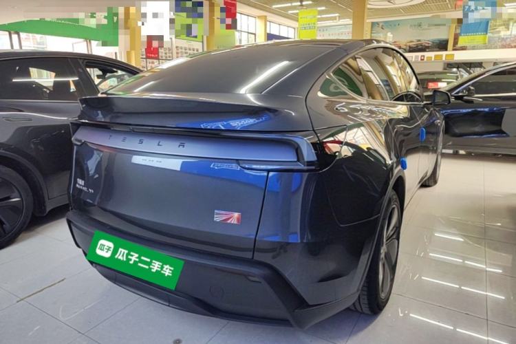 Used Tesla Model Y 2025 Long-Range All-Wheel Drive First Edition Rear Right 45 Deg