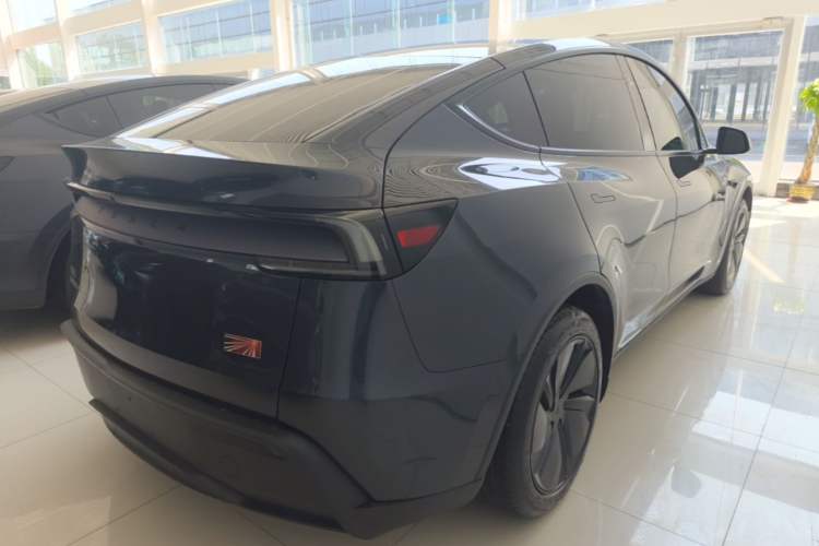 Used Tesla Model Y 2025 Rear-Wheel Drive First Edition Rear Right 45 Deg