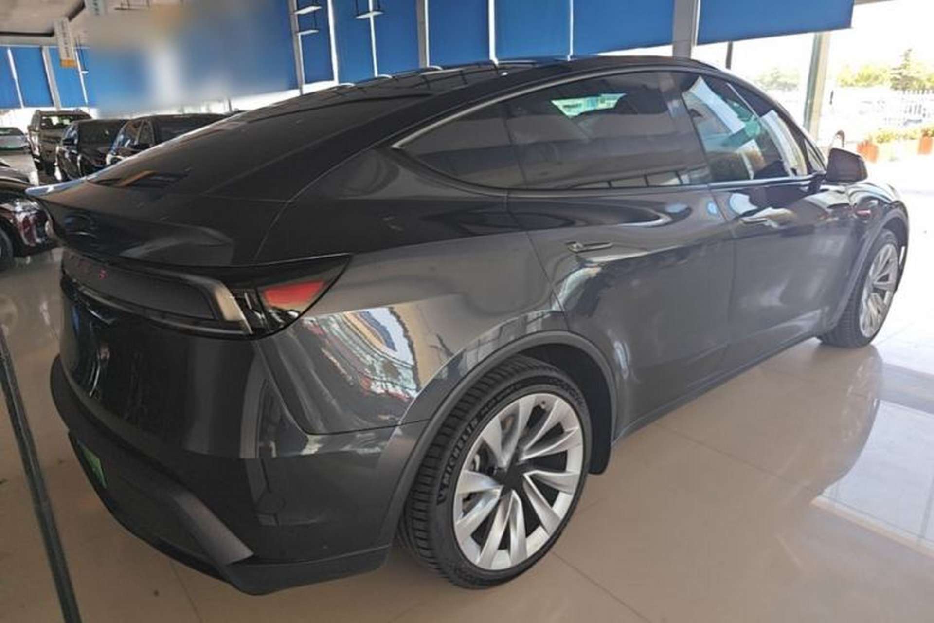 Used Tesla Model Y 2025 Long-Range All-Wheel Drive First Edition Rear Right 45 Deg
