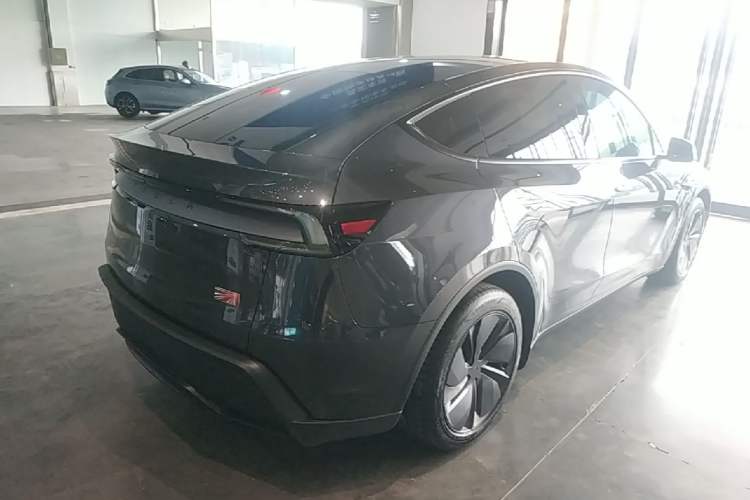 Used Tesla Model Y 2025 Rear-Wheel Drive First Edition Rear Right 45 Deg