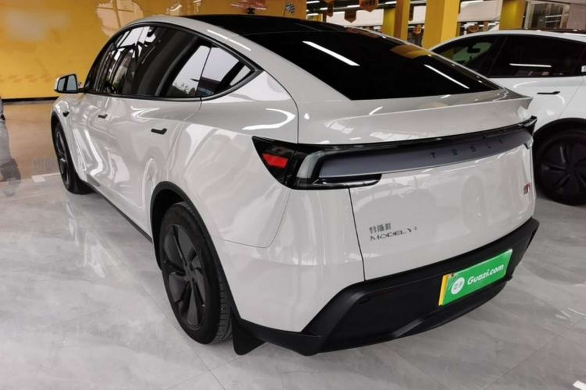 Used Tesla Model Y 2025 Long-Range All-Wheel Drive First Edition Rear Left 45 Deg