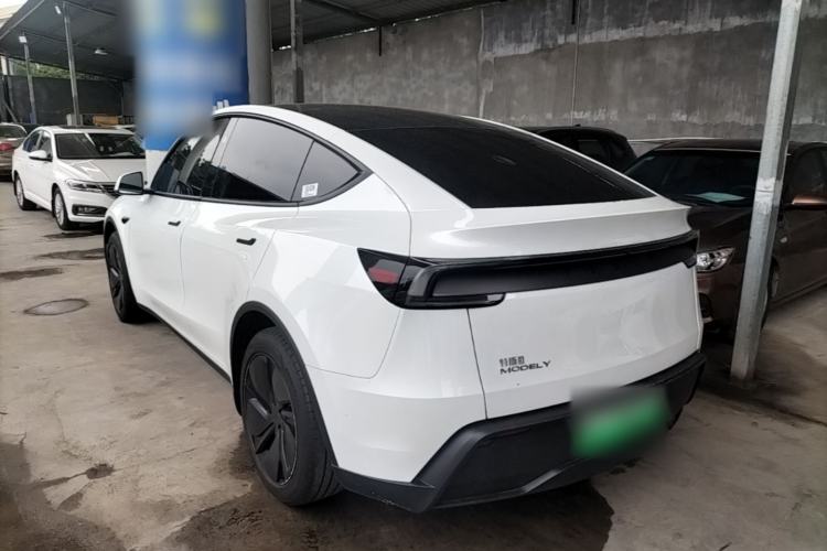 Used Tesla Model Y 2025 Rear-Wheel Drive First Edition Rear Left 45 Deg