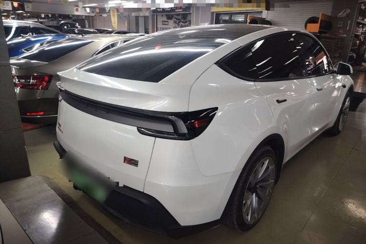 Used Tesla Model Y 2025 Rear-Wheel Drive First Edition Rear Right 45 Deg