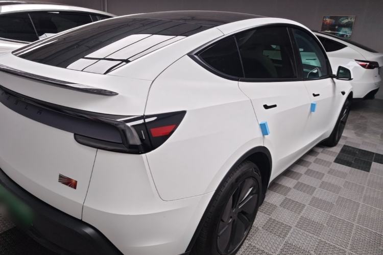 Used Tesla Model Y 2025 Long-Range All-Wheel Drive First Edition Rear Right 45 Deg