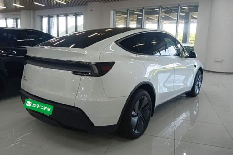 Used Tesla Model Y 2025 Rear-Wheel Drive First Edition Rear Right 45 Deg