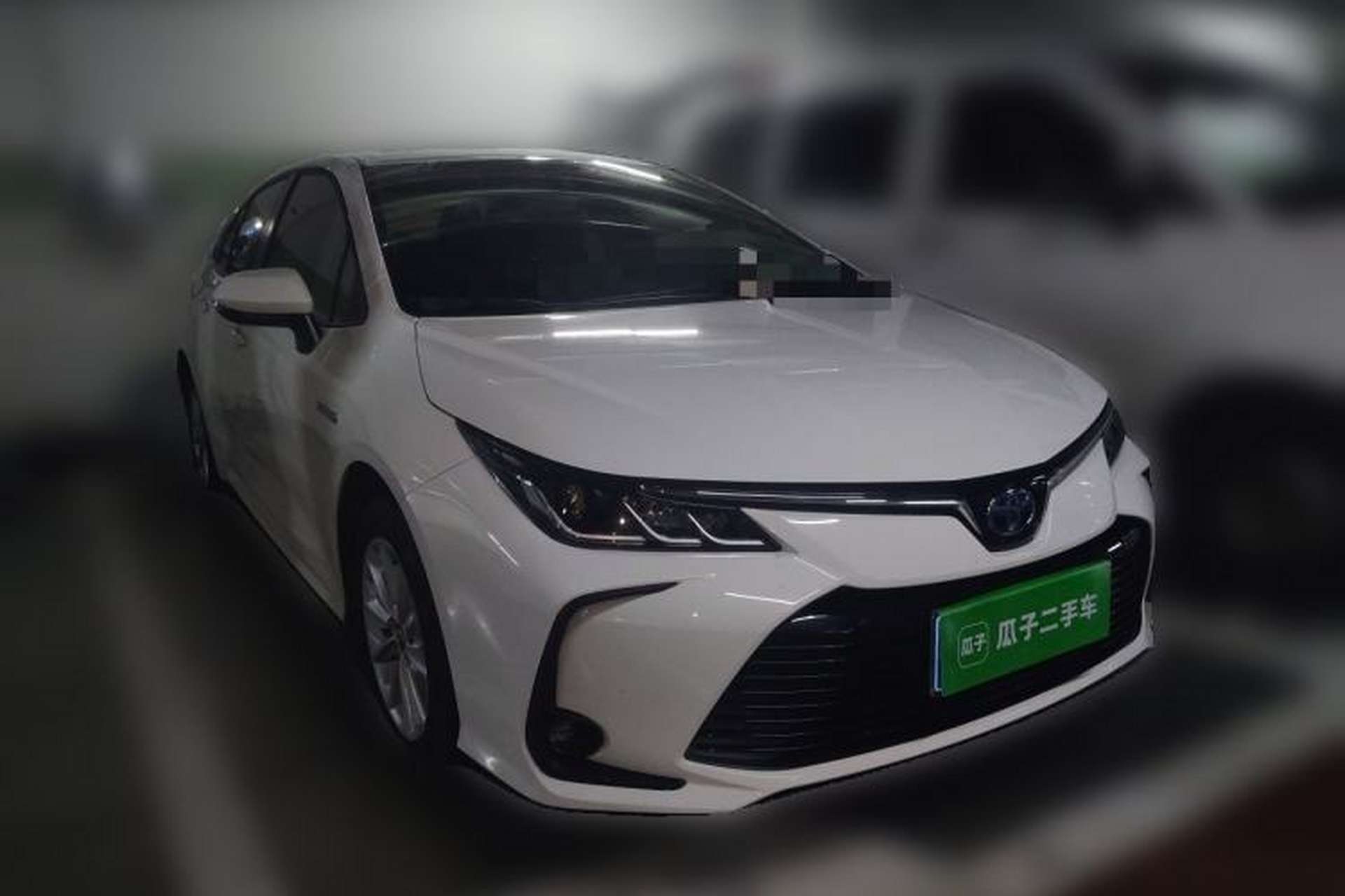 Used Toyota Corolla 2021 Dual-Motor 1.8L E-CVT Elite Edition Front Right 45 Deg