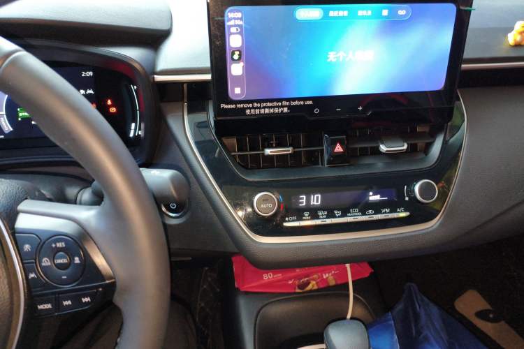 Used Toyota Corolla 2024 1.8L Smart Electric Hybrid Dual-Engine Elite Edition Audio And AC Panel