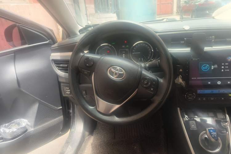 Used Toyota Levin 2016 Dual-Engine 1.8H GS E-CVT Elite Model with Sunroof Steering Wheel