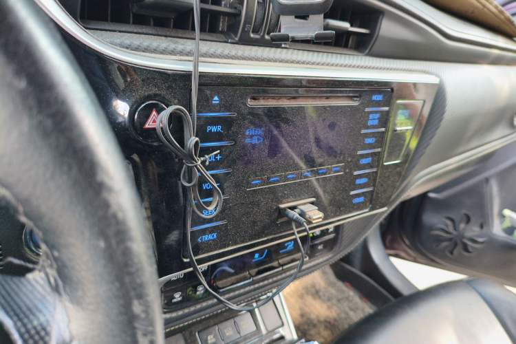 Used Toyota Levin 2017 Revised Dual-Engine 1.8H GS E-CVT Elite Sunroof Version China V Standard Audio And AC Panel