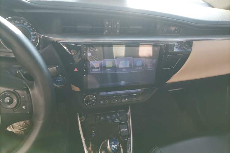 Used Toyota Levin 2017 Revised Dual-Engine 1.8H GS E-CVT Elite Sunroof Version China V Standard Audio And AC Panel