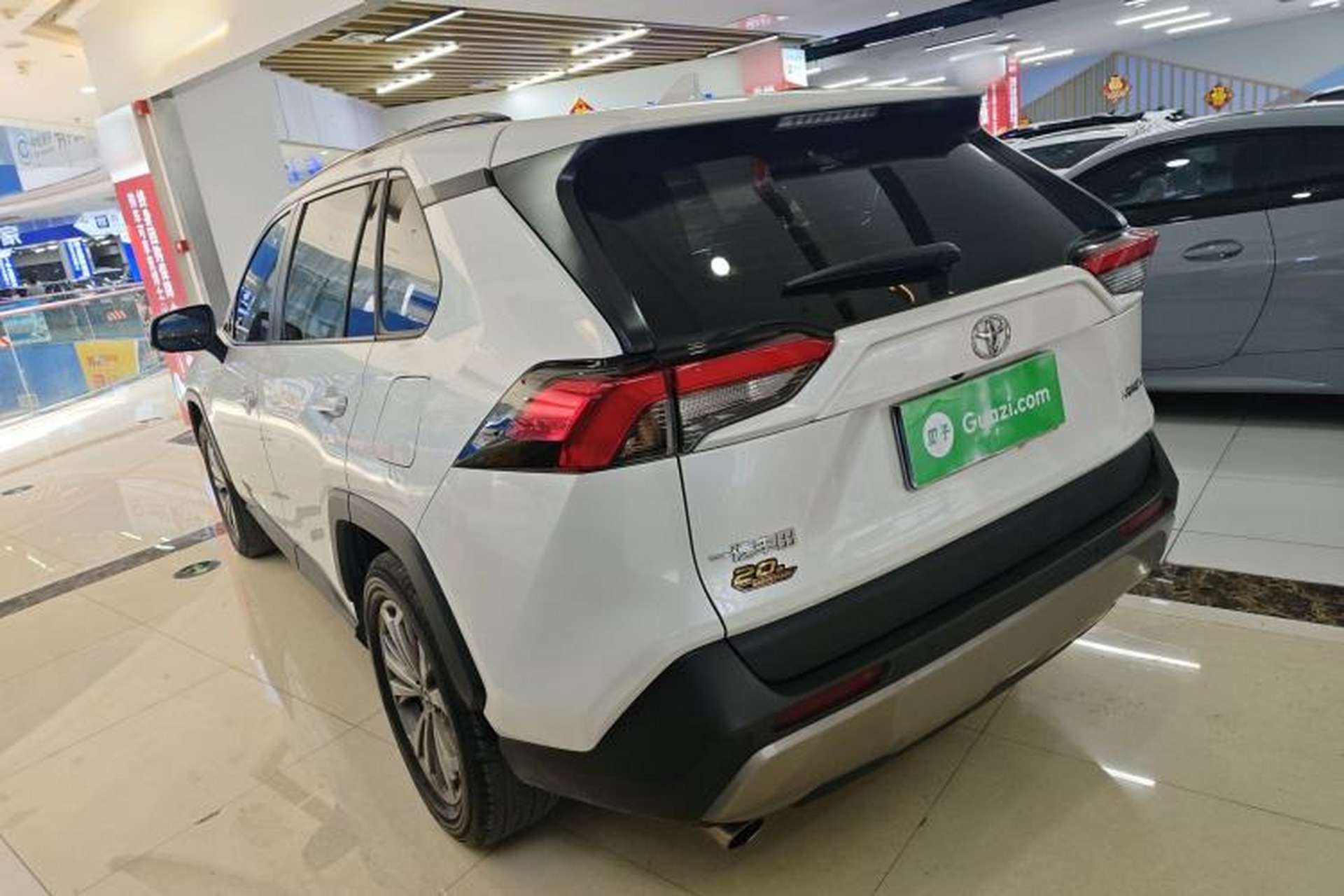 Used Toyota RAV4 2023 2.0L CVT Two-Wheel Drive 20th Anniversary Platinum Edition Rear Left 45 Deg