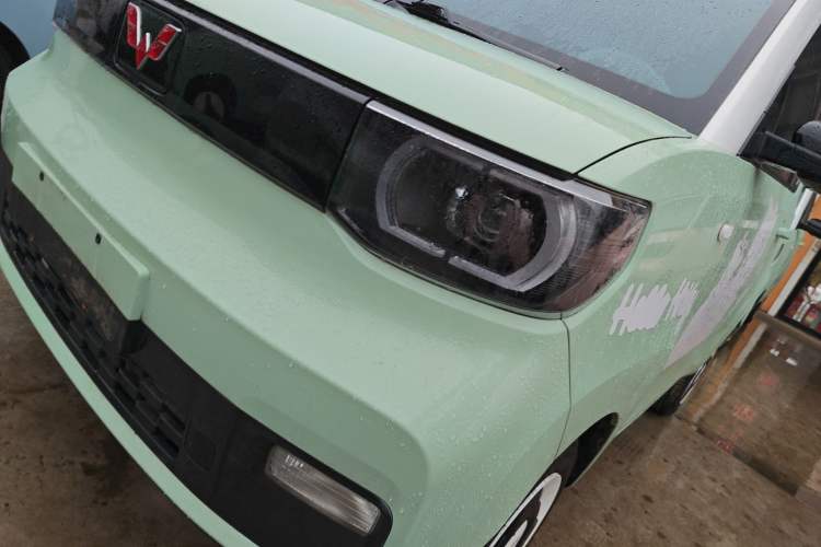 Used Wuling Hongguang MINIEV 2021 Macaron Sandwich Model 120 km Lithium Iron Phosphate Left Front Headlight