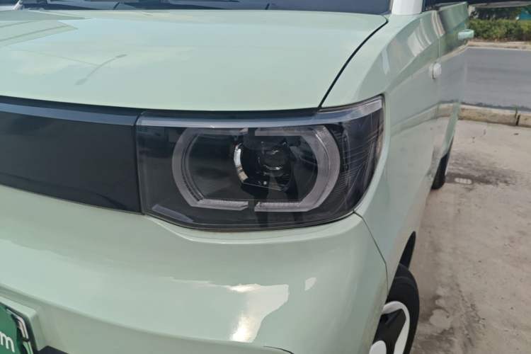Used Wuling Hongguang MINIEV 2021 Macaron Sandwich Model 120 km Lithium NMC Left Front Headlight