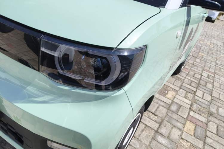 Used Wuling Hongguang MINIEV 2021 Macaron Sandwich Model 120 km Lithium Iron Phosphate Left Front Headlight