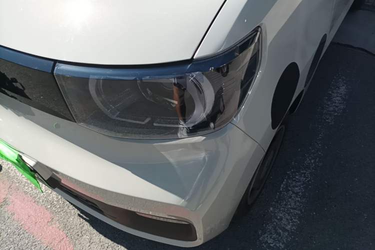 Used Wuling Hongguang MINIEV 2021 Macaron Sandwich Model 120 km Lithium NMC Left Front Headlight
